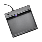 Black electronic device with a cable on a white background